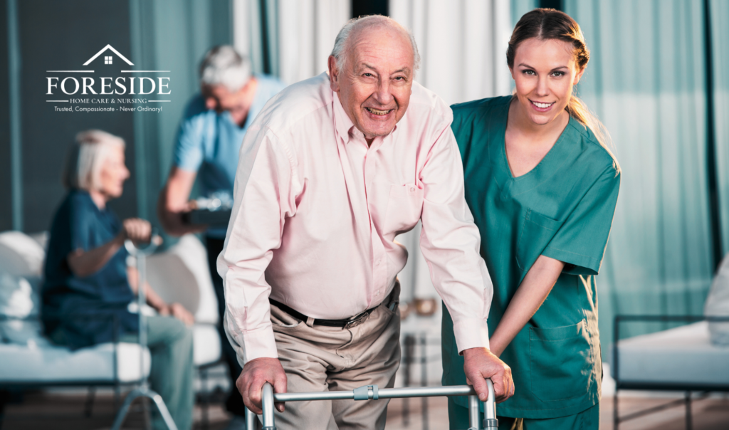 Smiling caregiver assists elderly man with walker.